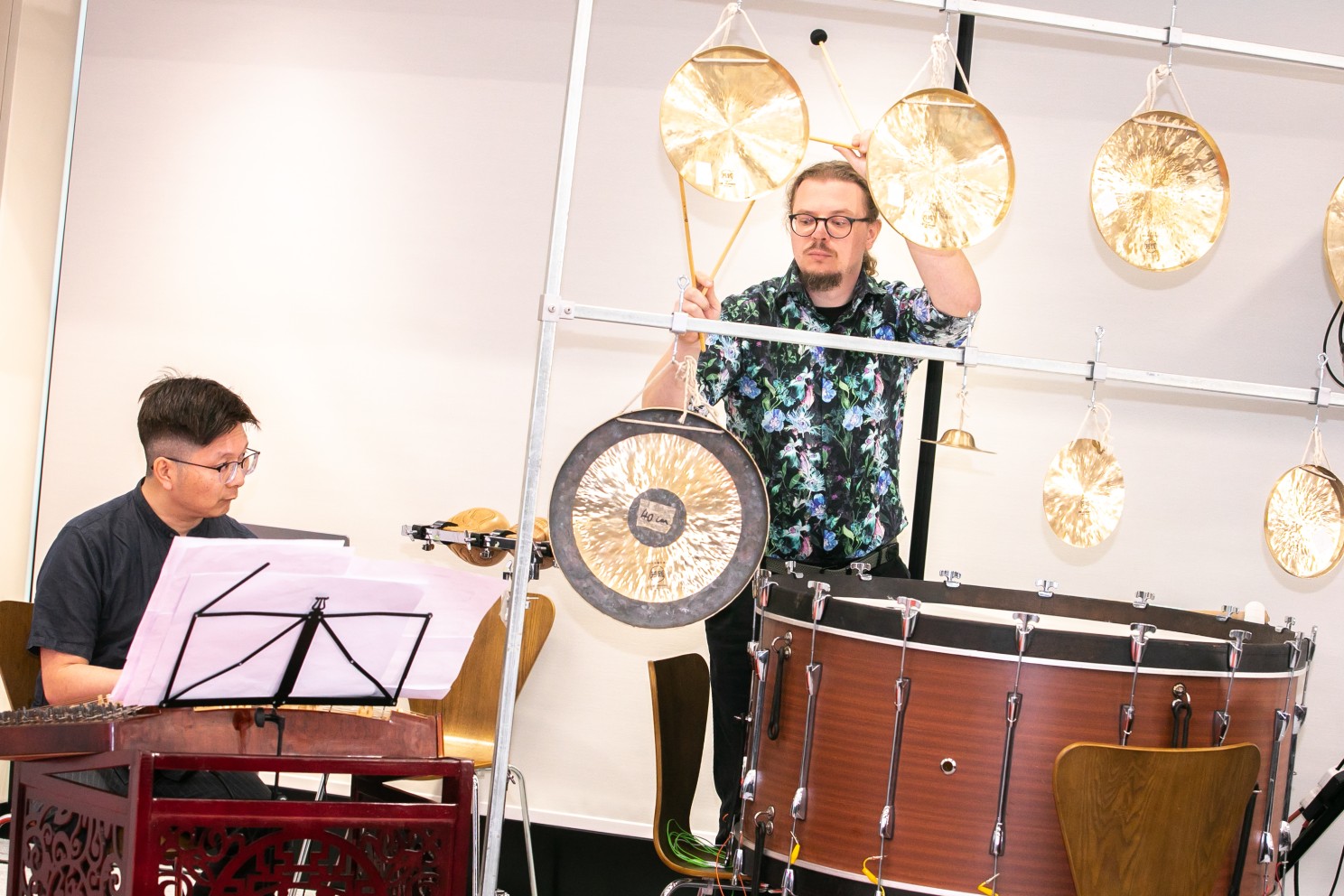 Prof Ip Kim-ho (left), Professor Practice and Head of the Wong Bing Lai Music and Performing Arts Unit and Prof Enrico Bertelli (right), Associate Professor of Practice present an immersive music performance with various musical instruments at the ceremony.